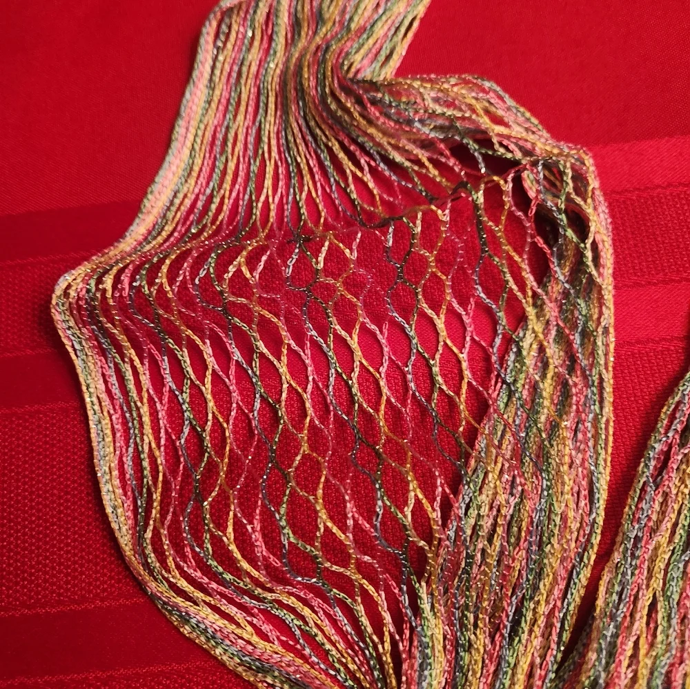 Multicoloured knitted scarf with fringe #knitwear #festival